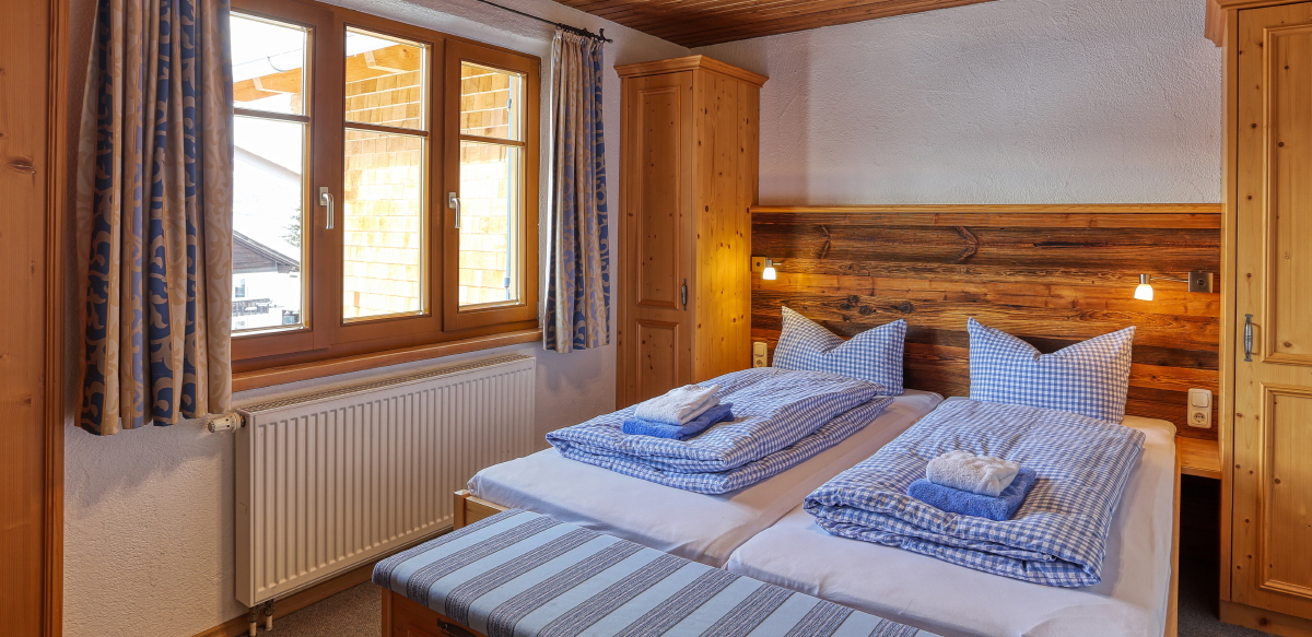 Doppelzimmer Standard ohne Balkon - Schlafzimmer | Berggasthof Sonne in Sonthofen